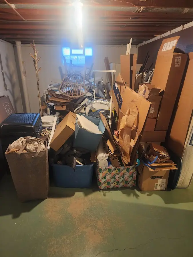 Roll-off dumpster container at job site for Yard Waste Dumpster Rental in Franklin